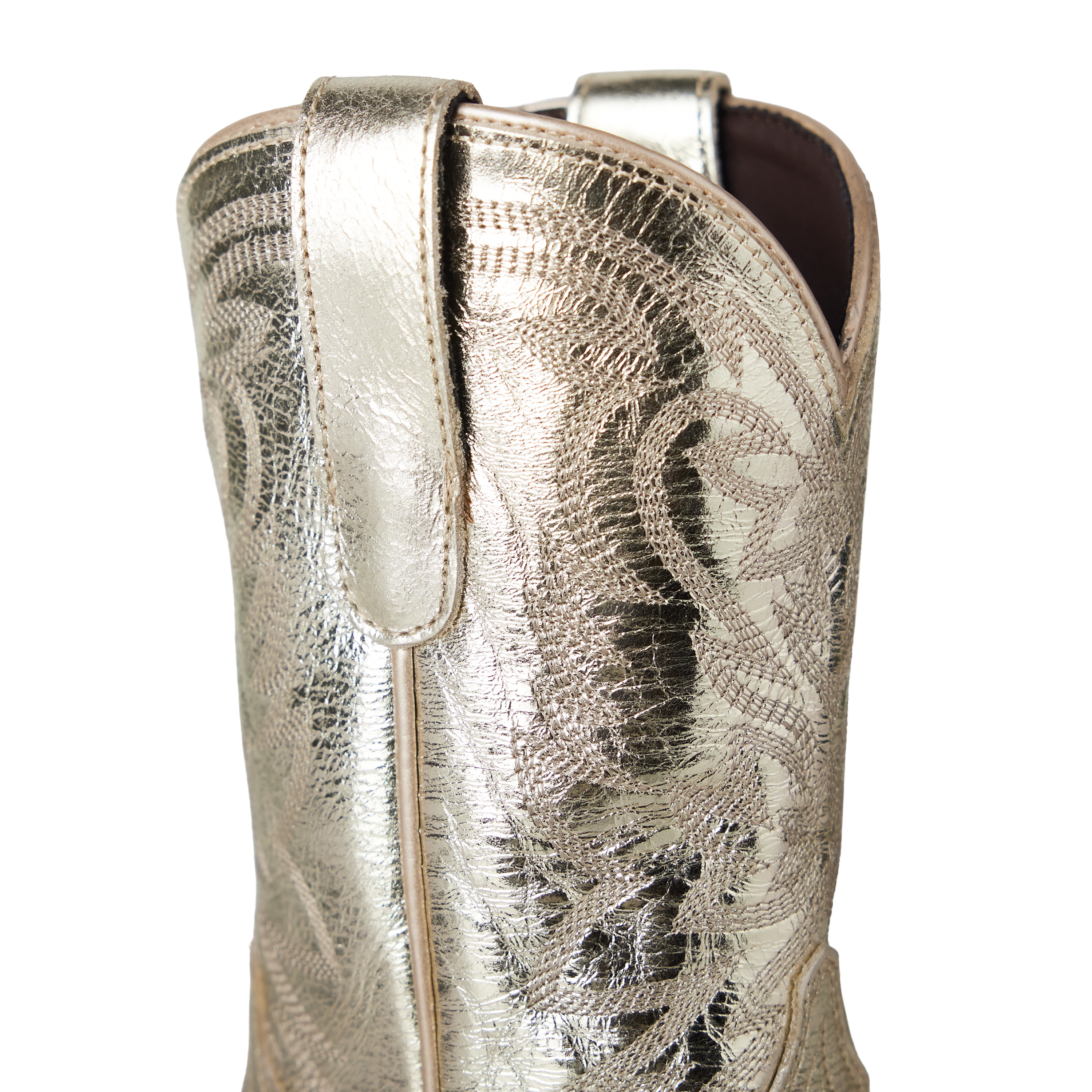 Close-up of a metallic cowboy boot with detailed patterns on a white background