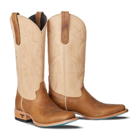Pair of tan cowboy boots with brown accents on a white background