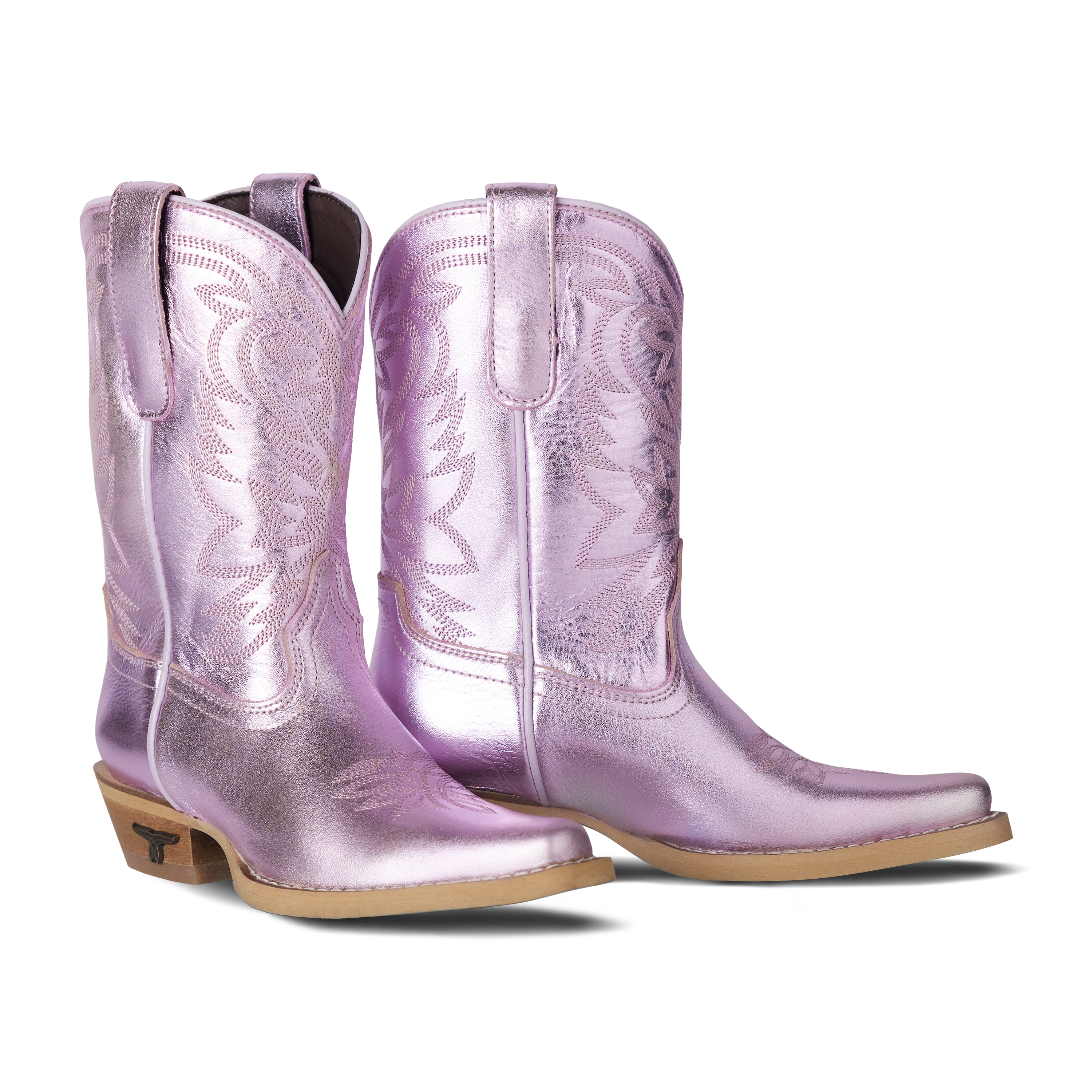 Pair of purple cowboy boots on a white background