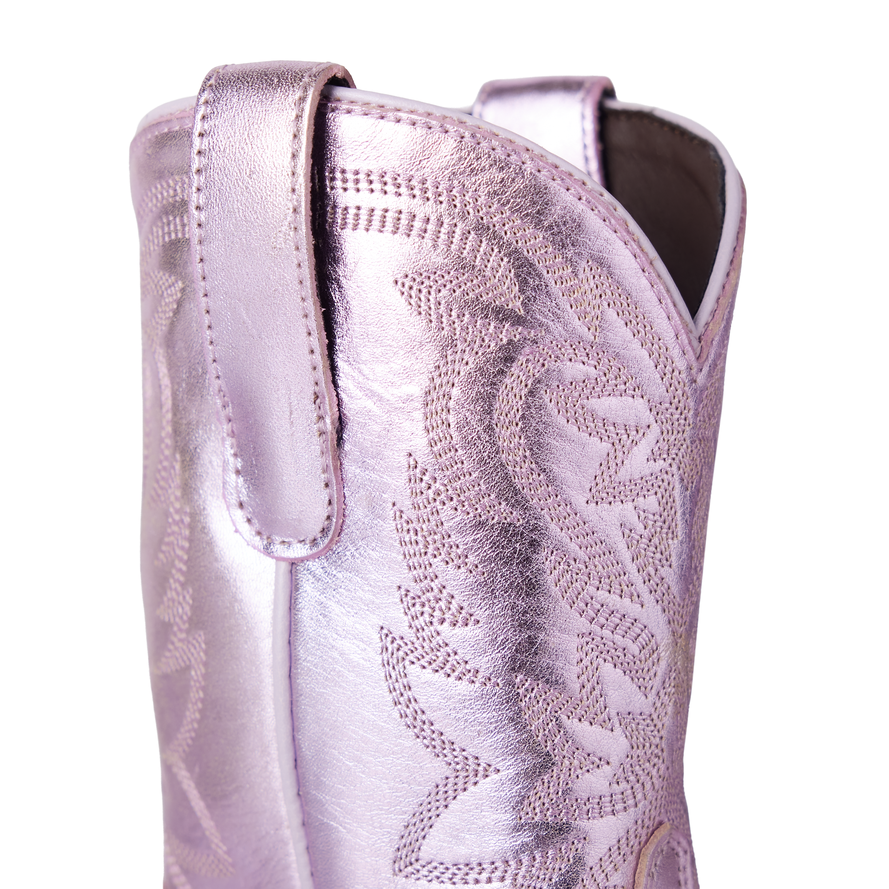 Close-up of a pink cowboy boot with intricate patterns on a white background